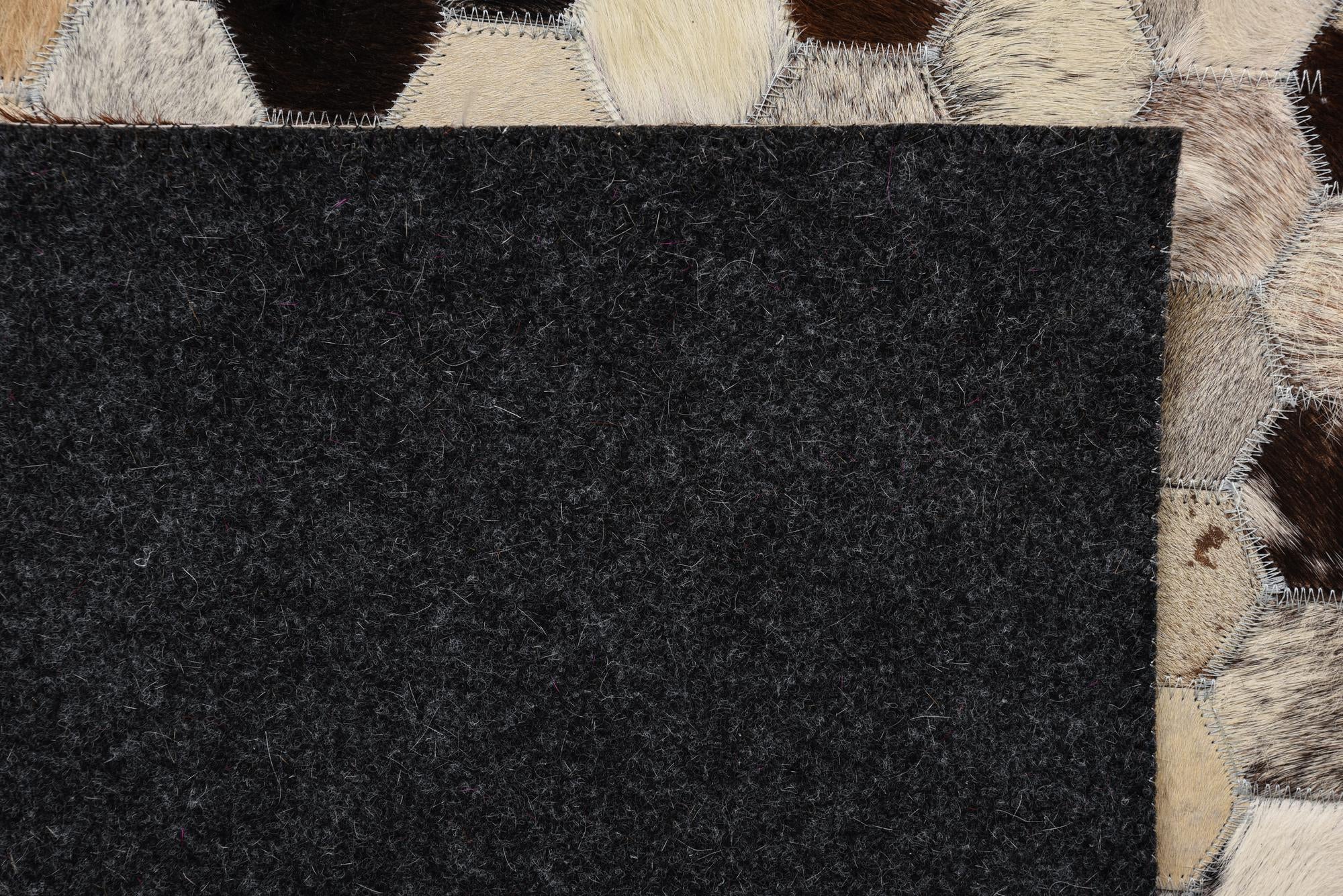 5' 1 x 7' 10 Cowhide Rug