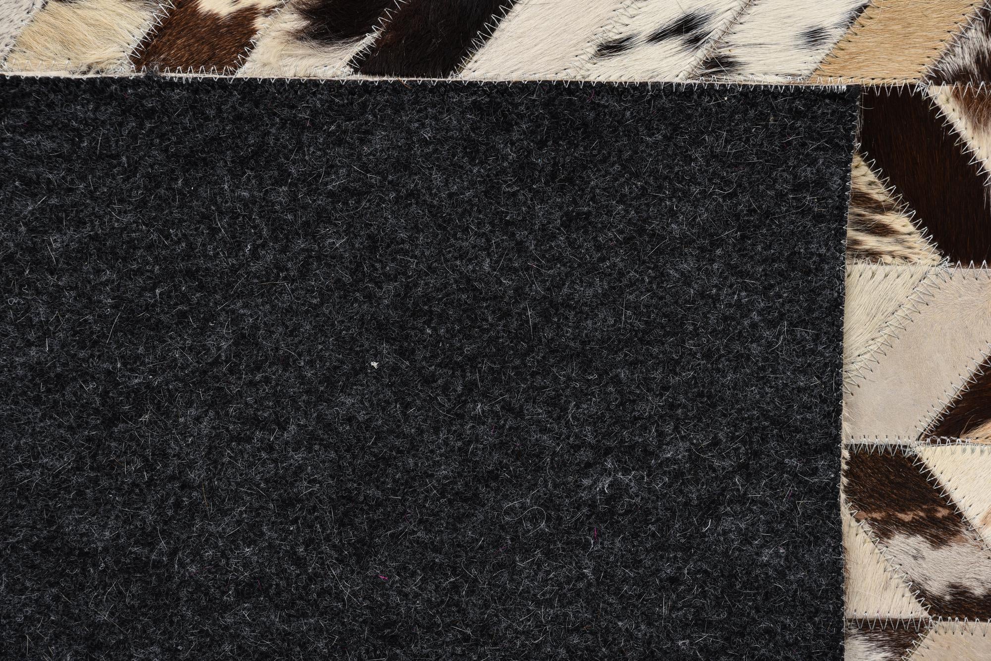 5' 2 x 8' Cowhide Rug