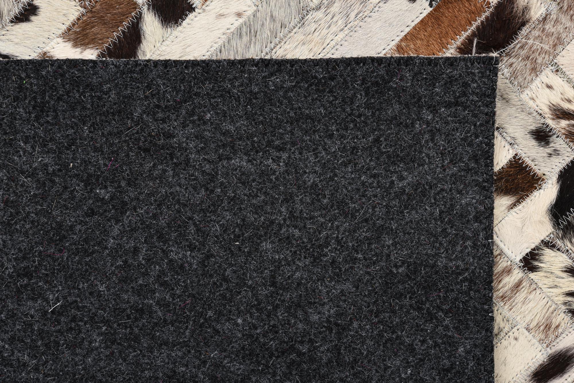 5' x 7' 9 Cowhide Rug