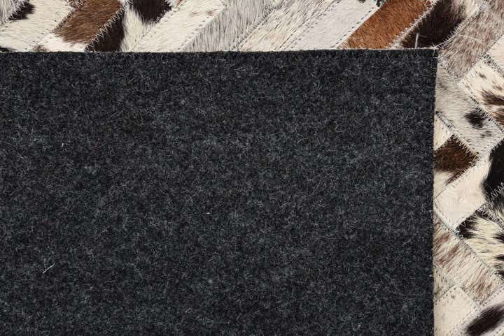 5' x 7' 9 Cowhide Rug