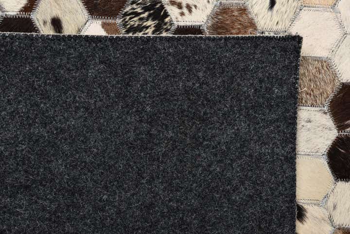 5' 1 x 8' Cowhide Rug