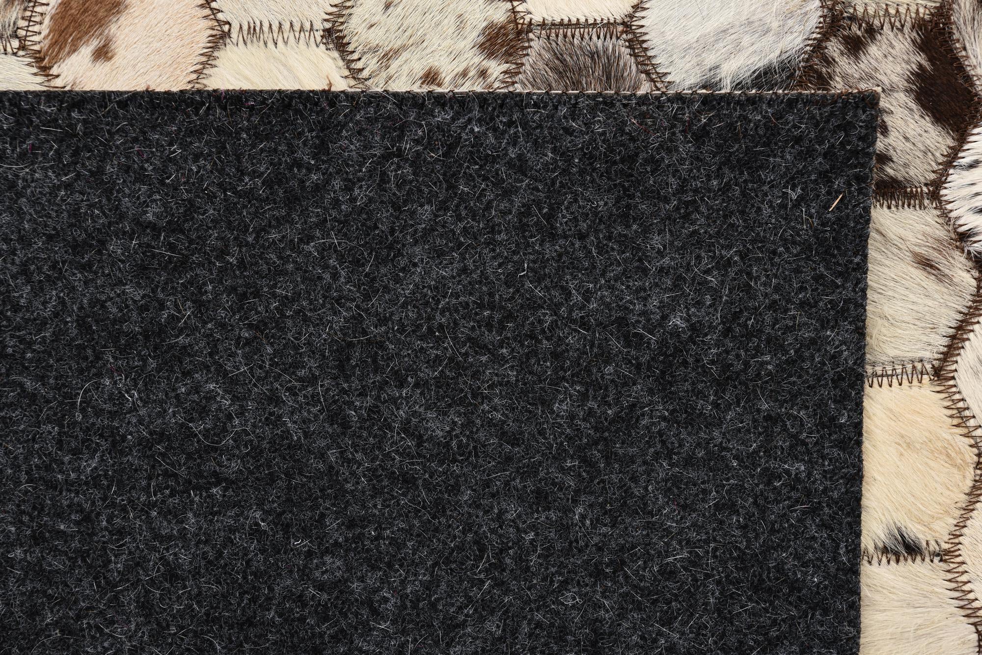 5' 1 x 8' 2 Cowhide Rug