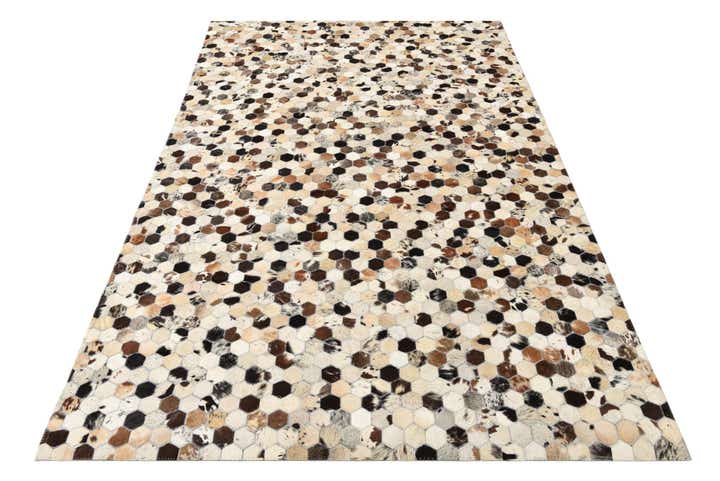 5' 2 x 7' 10 Cowhide Rug