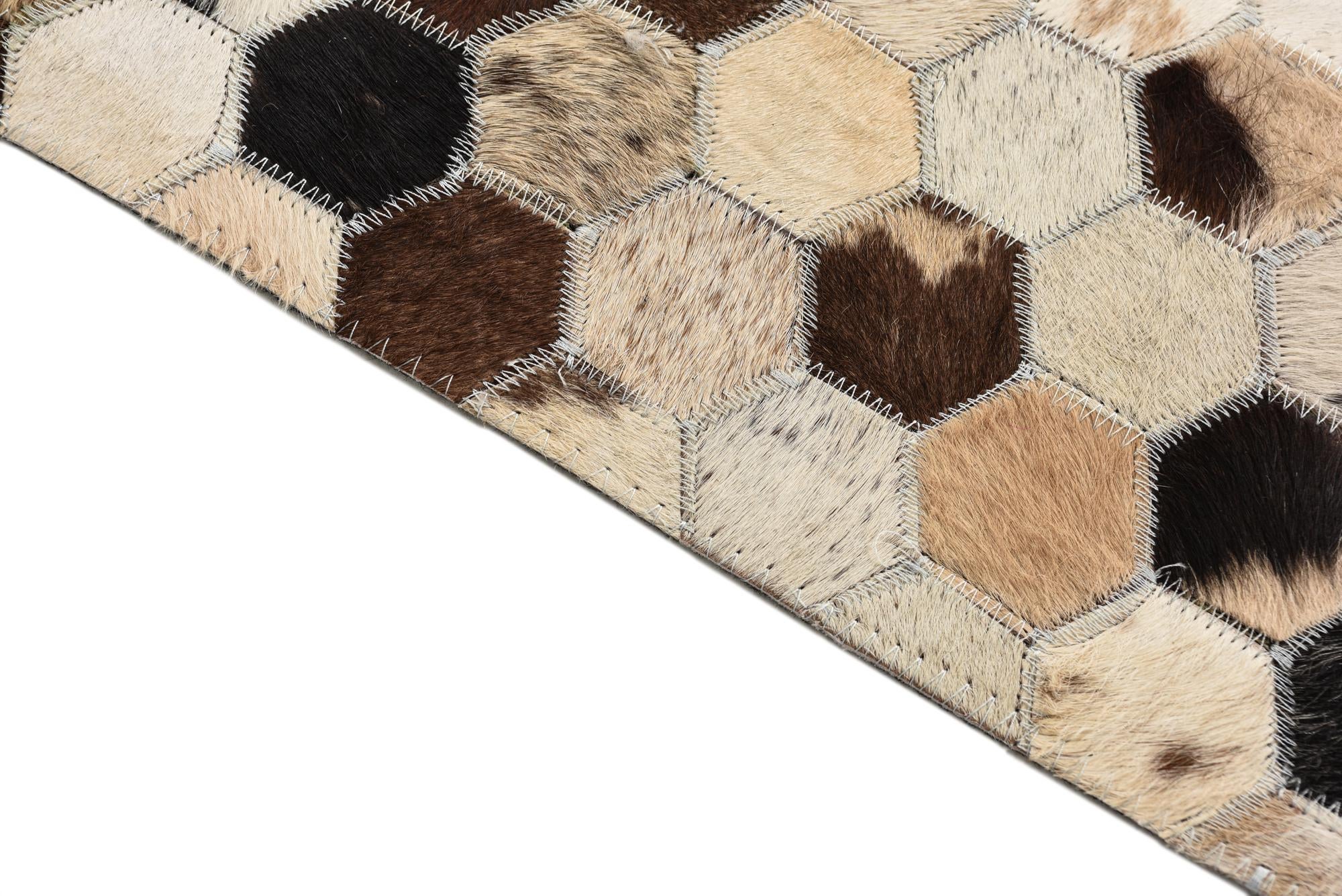 5' 2 x 7' 10 Cowhide Rug