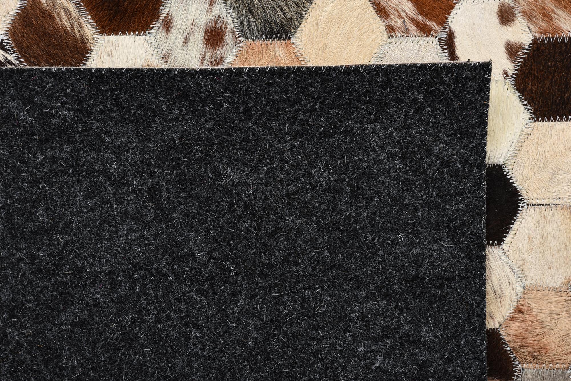 5' 2 x 7' 10 Cowhide Rug