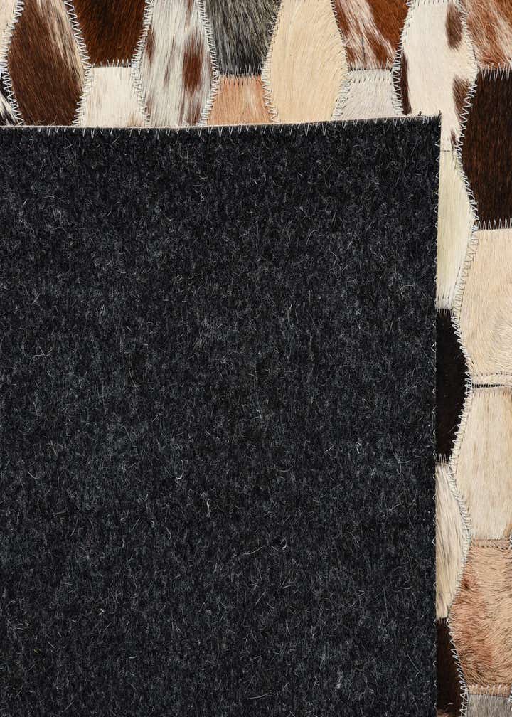 5' 2 x 7' 10 Cowhide Rug