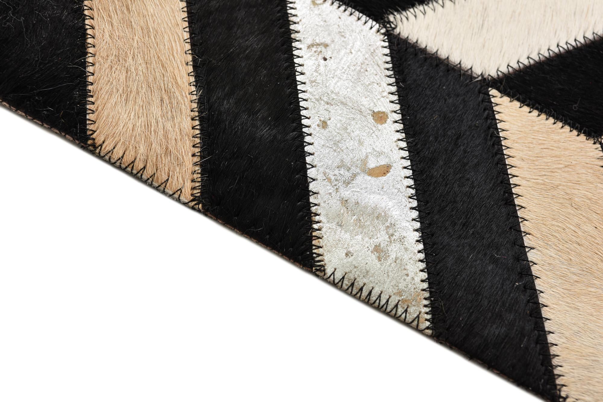 5' 2 x 8' Cowhide Rug