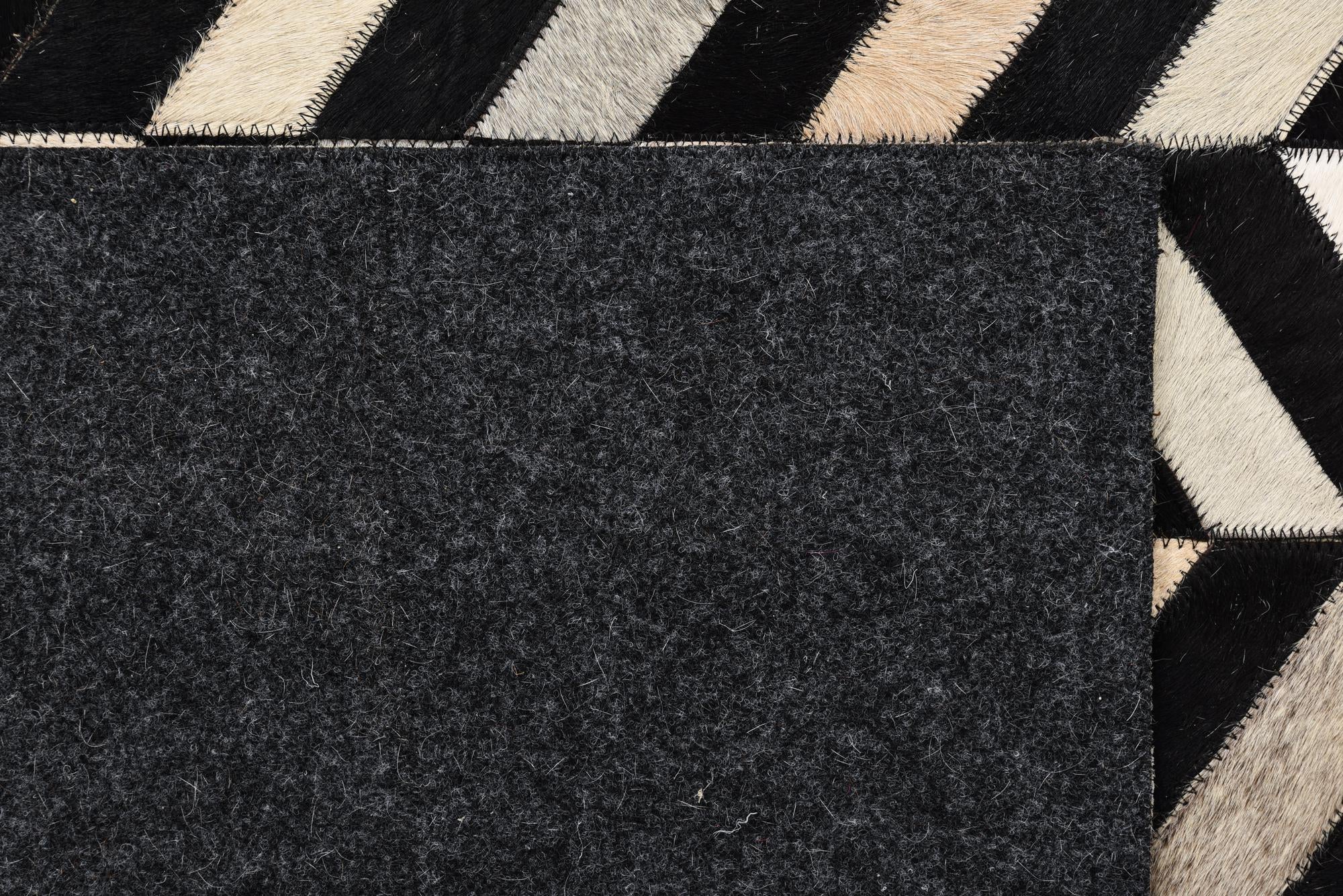 5' 2 x 8' Cowhide Rug