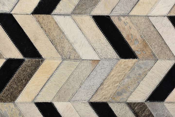 5' 2 x 8' 3 Cowhide Rug