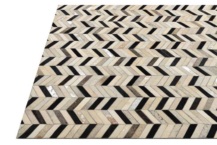 5' 2 x 8' 1 Cowhide Rug