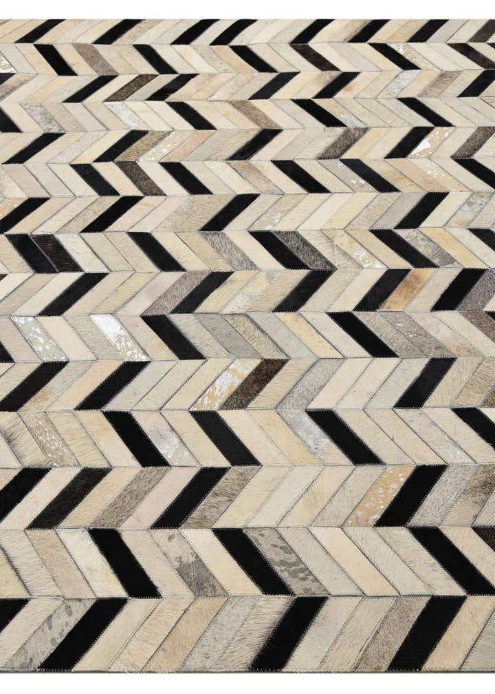 5' 2 x 8' 1 Cowhide Rug