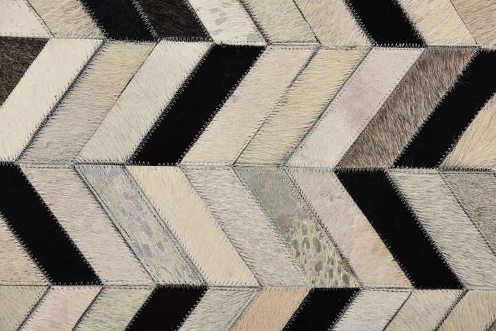5' 2 x 8' 1 Cowhide Rug