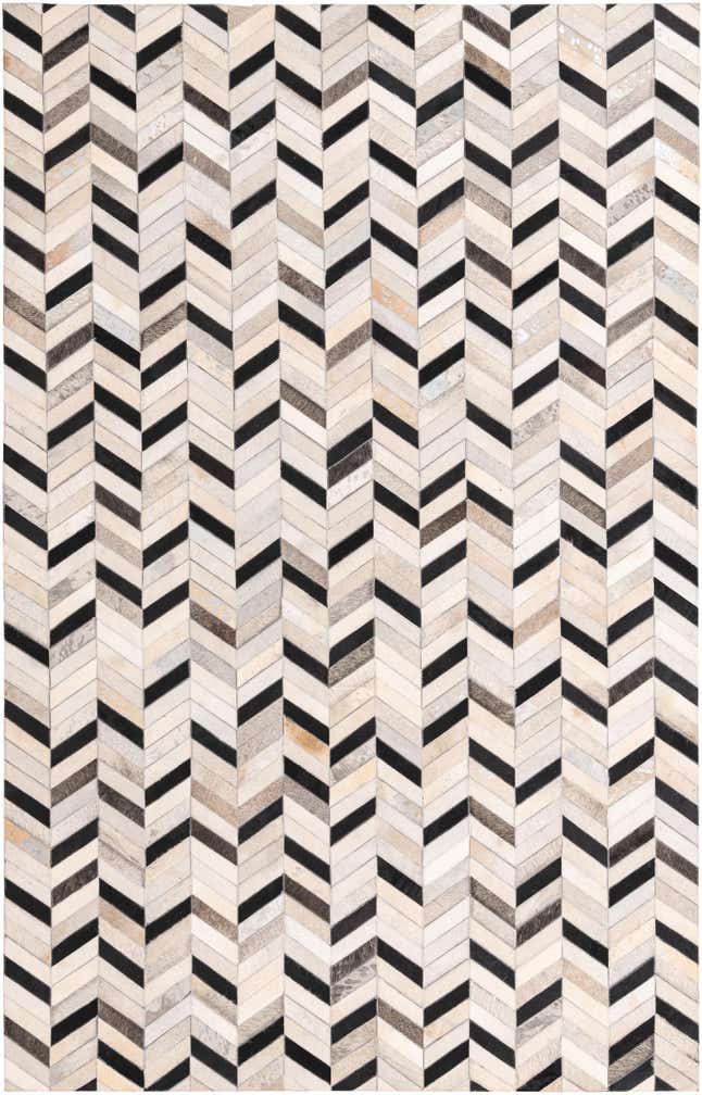 5' 2 x 8' 1 Cowhide Rug