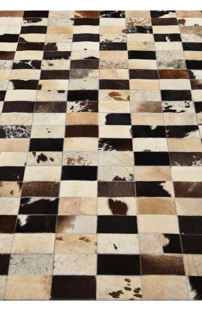 5' 2 x 7' 6 Cowhide Rug