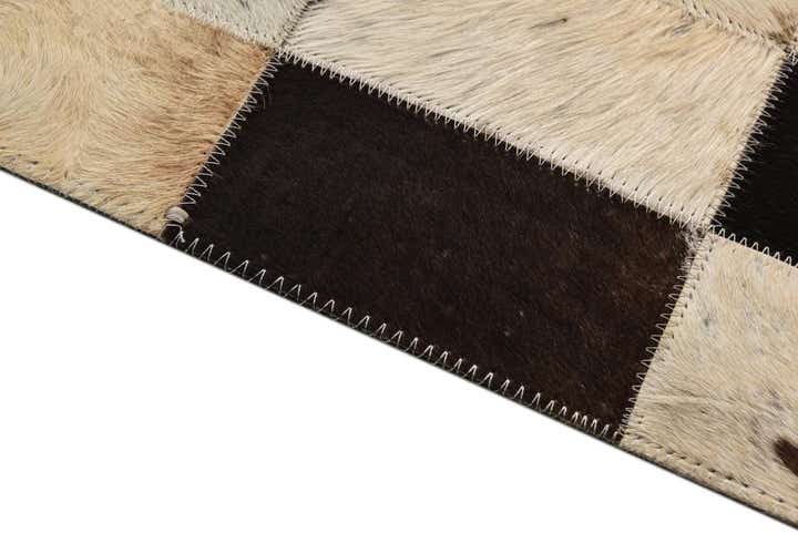 5' 2 x 7' 6 Cowhide Rug