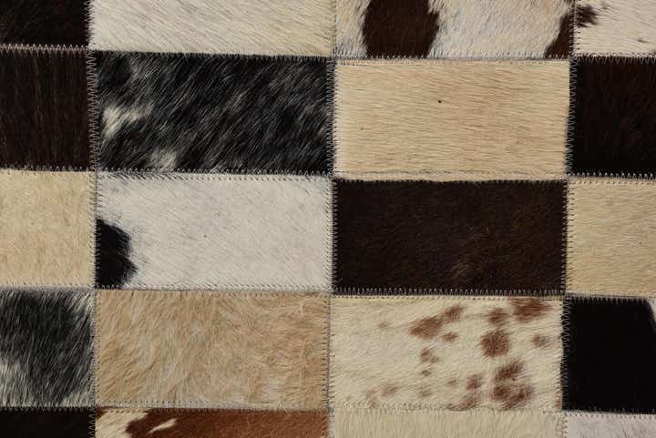 5' 2 x 7' 6 Cowhide Rug