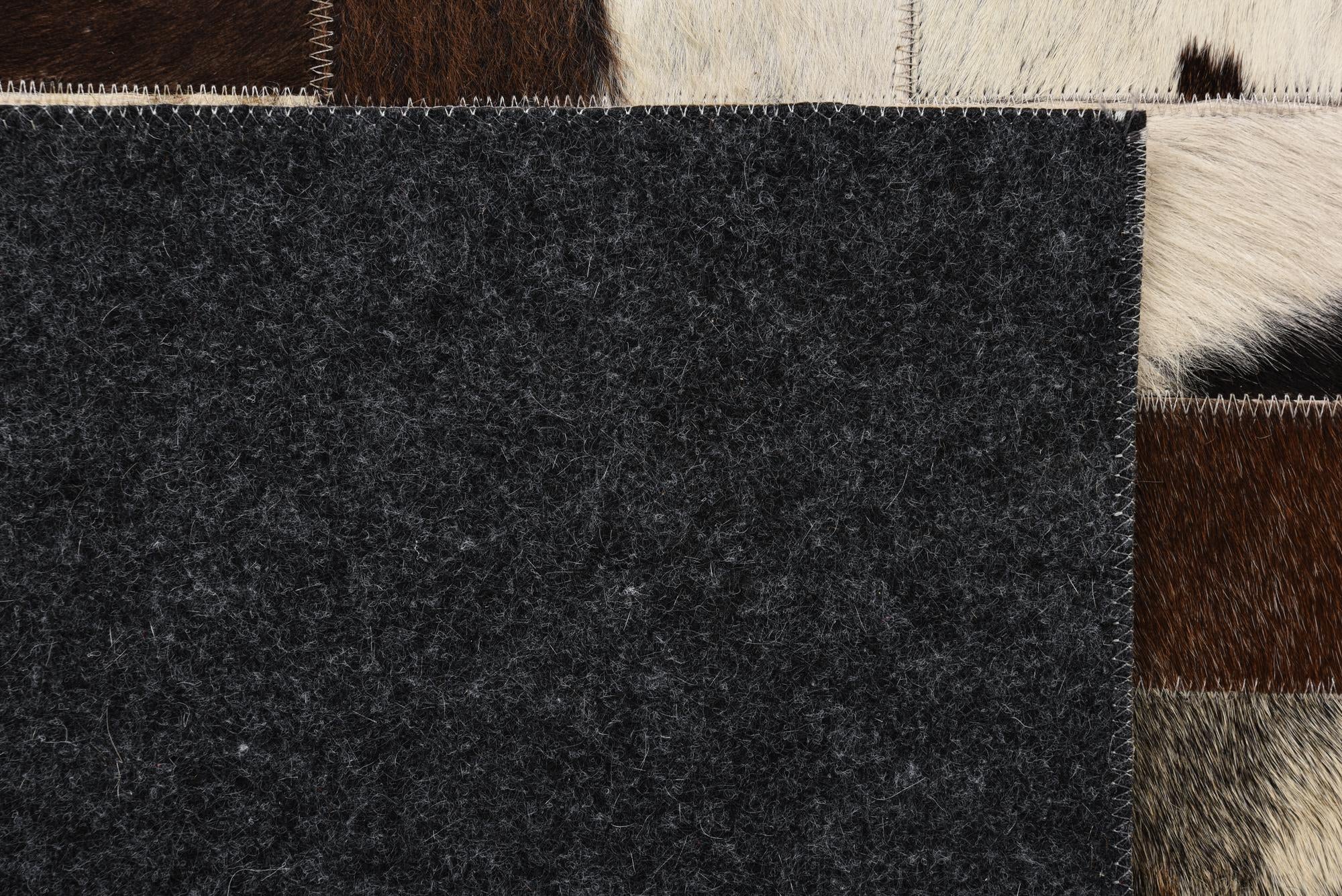 5' 2 x 7' 6 Cowhide Rug