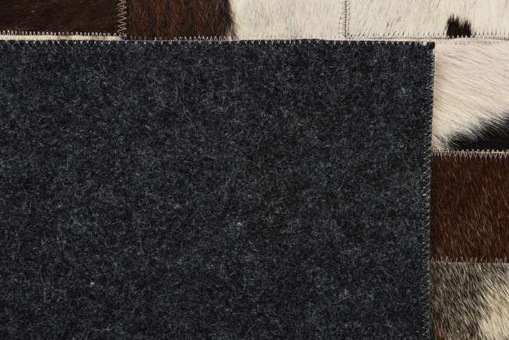 5' 2 x 7' 6 Cowhide Rug