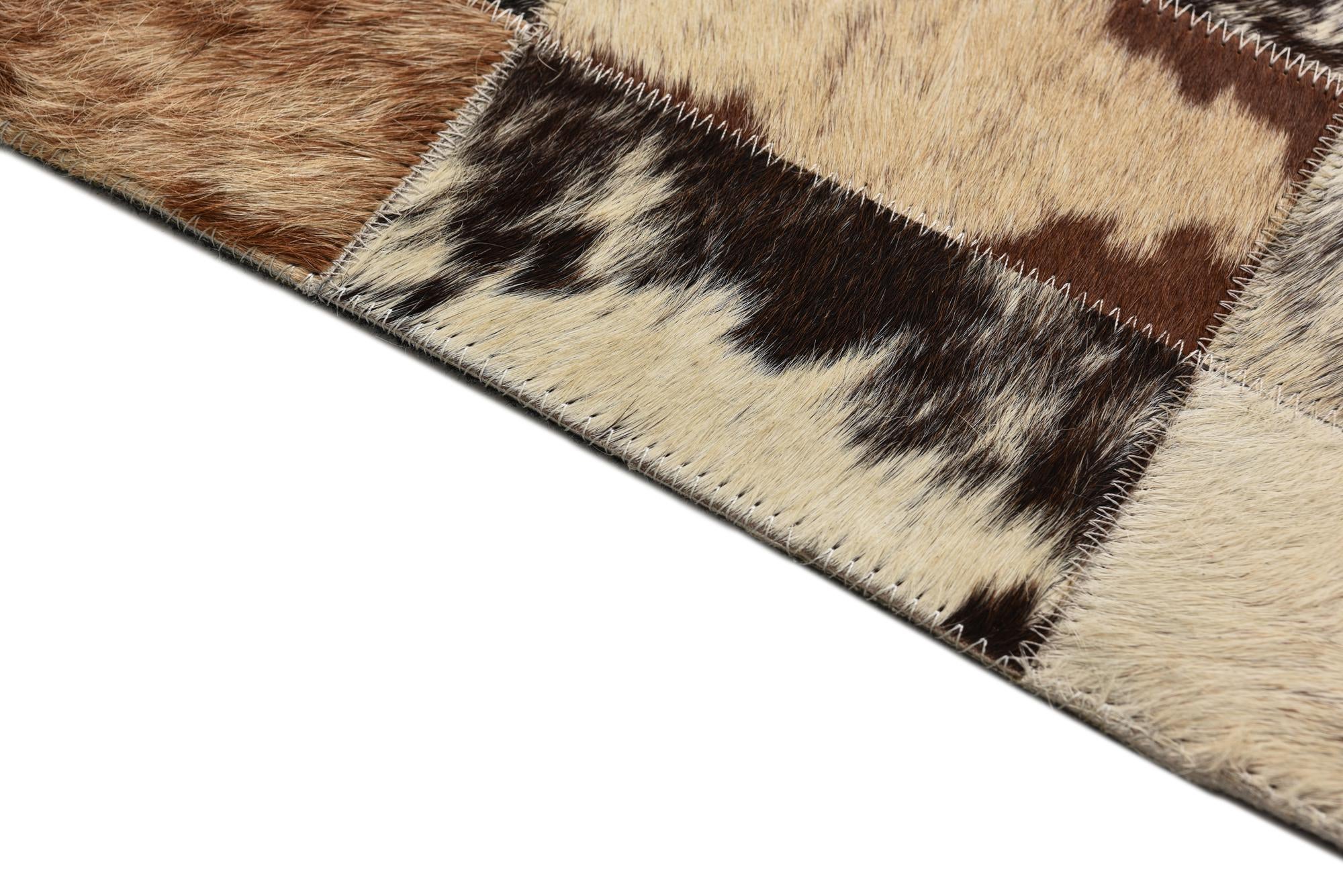 5' 2 x 7' 6 Cowhide Rug