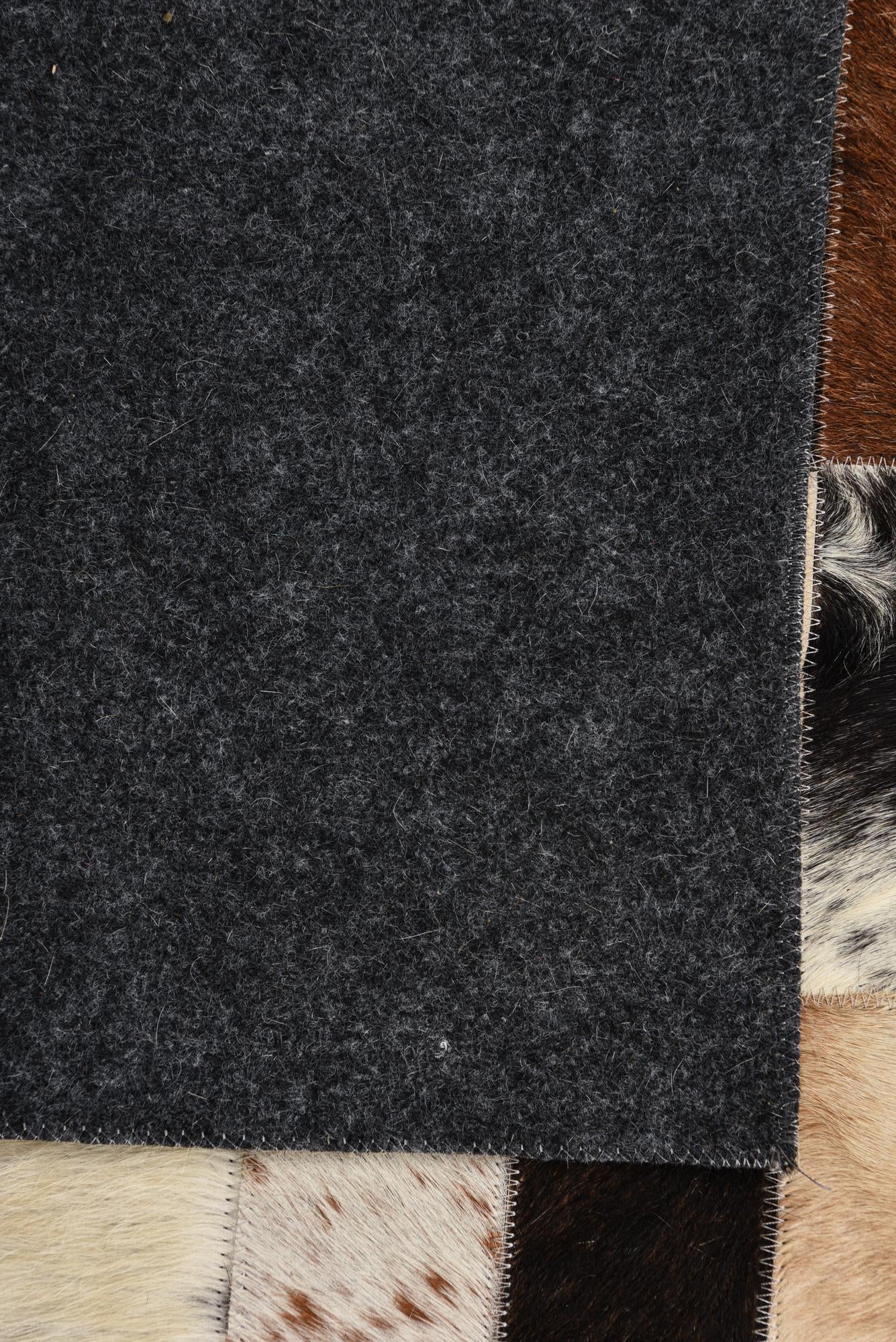 5' 2 x 7' 6 Cowhide Rug