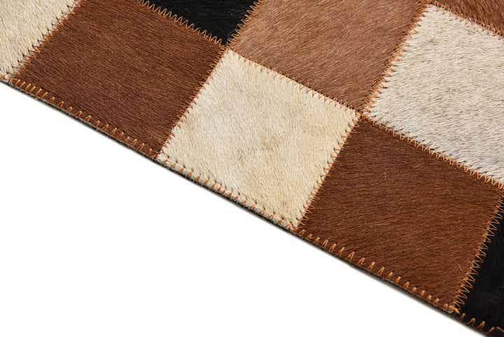5' 1 x 7' 10 Cowhide Rug