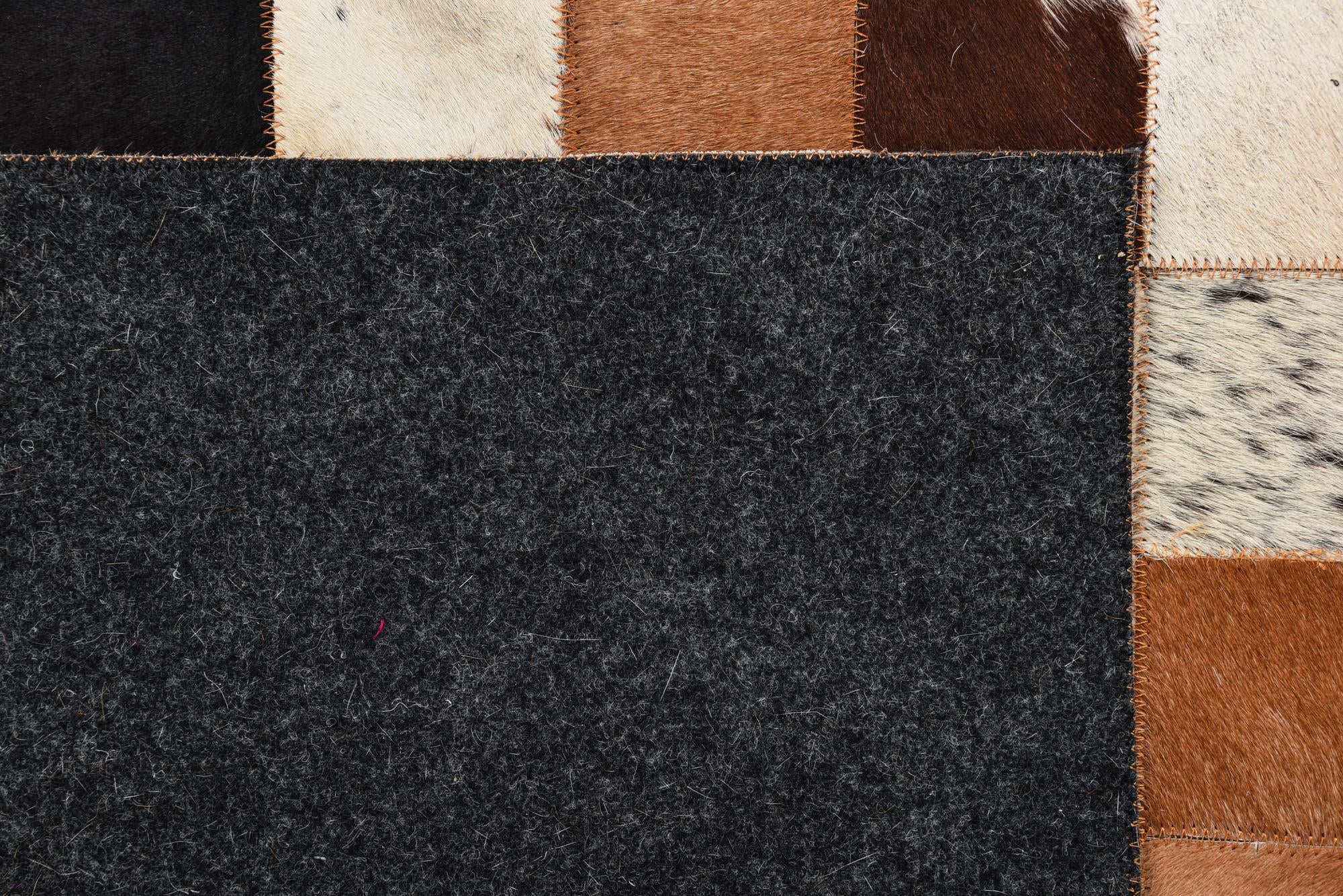 5' 1 x 7' 10 Cowhide Rug