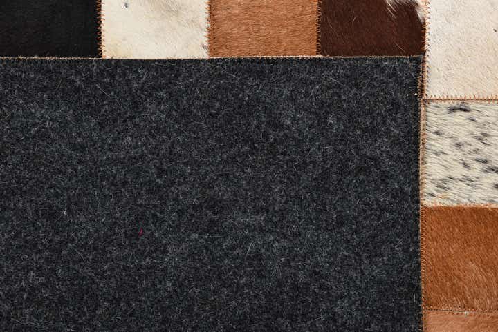 5' 1 x 7' 10 Cowhide Rug