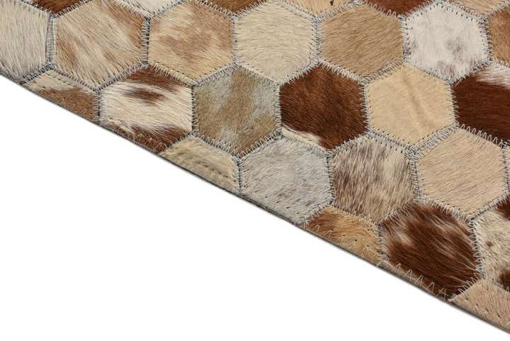 8' 1 x 9' 10 Cowhide Rug