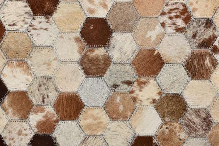 8' 1 x 9' 10 Cowhide Rug