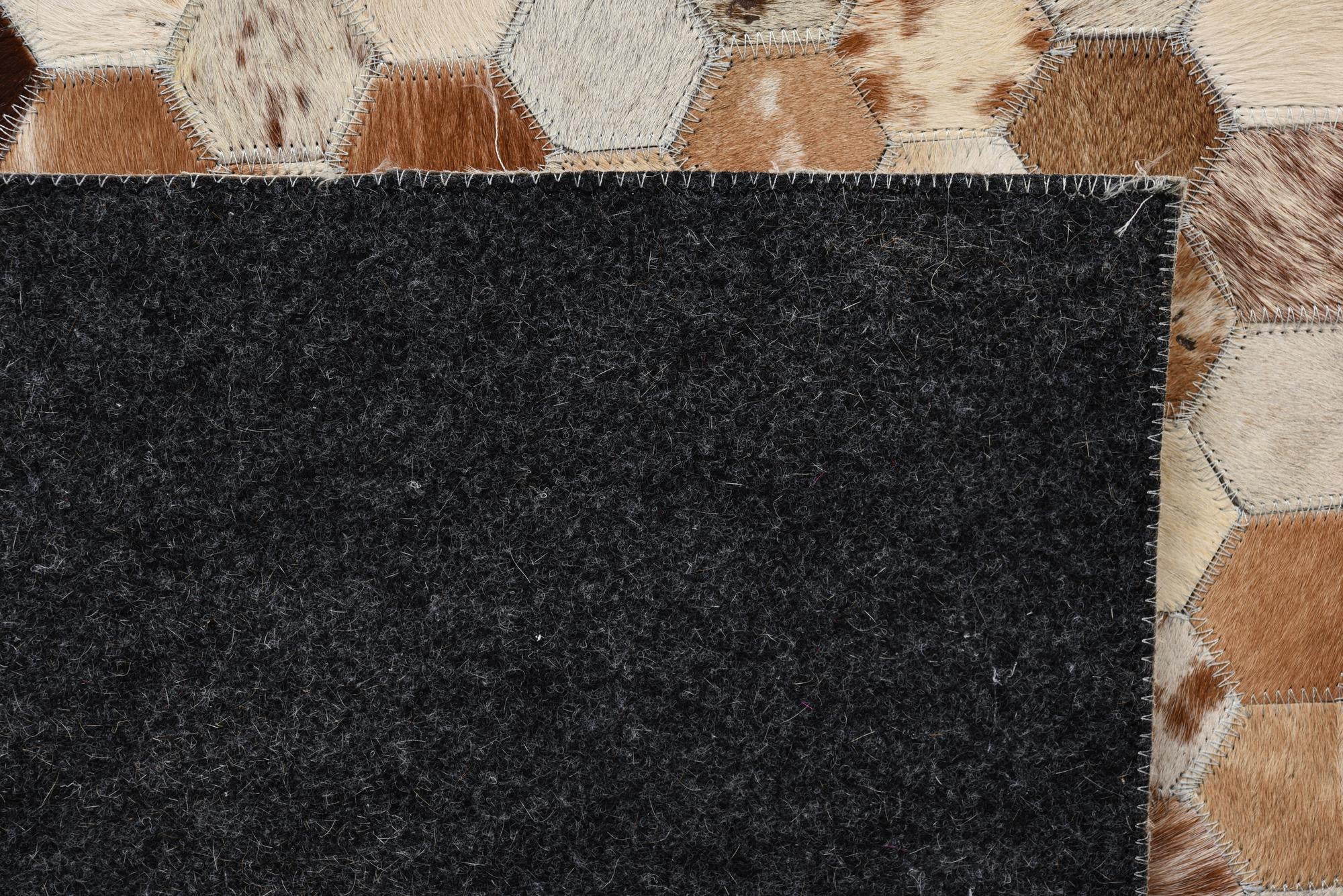 8' 1 x 9' 10 Cowhide Rug