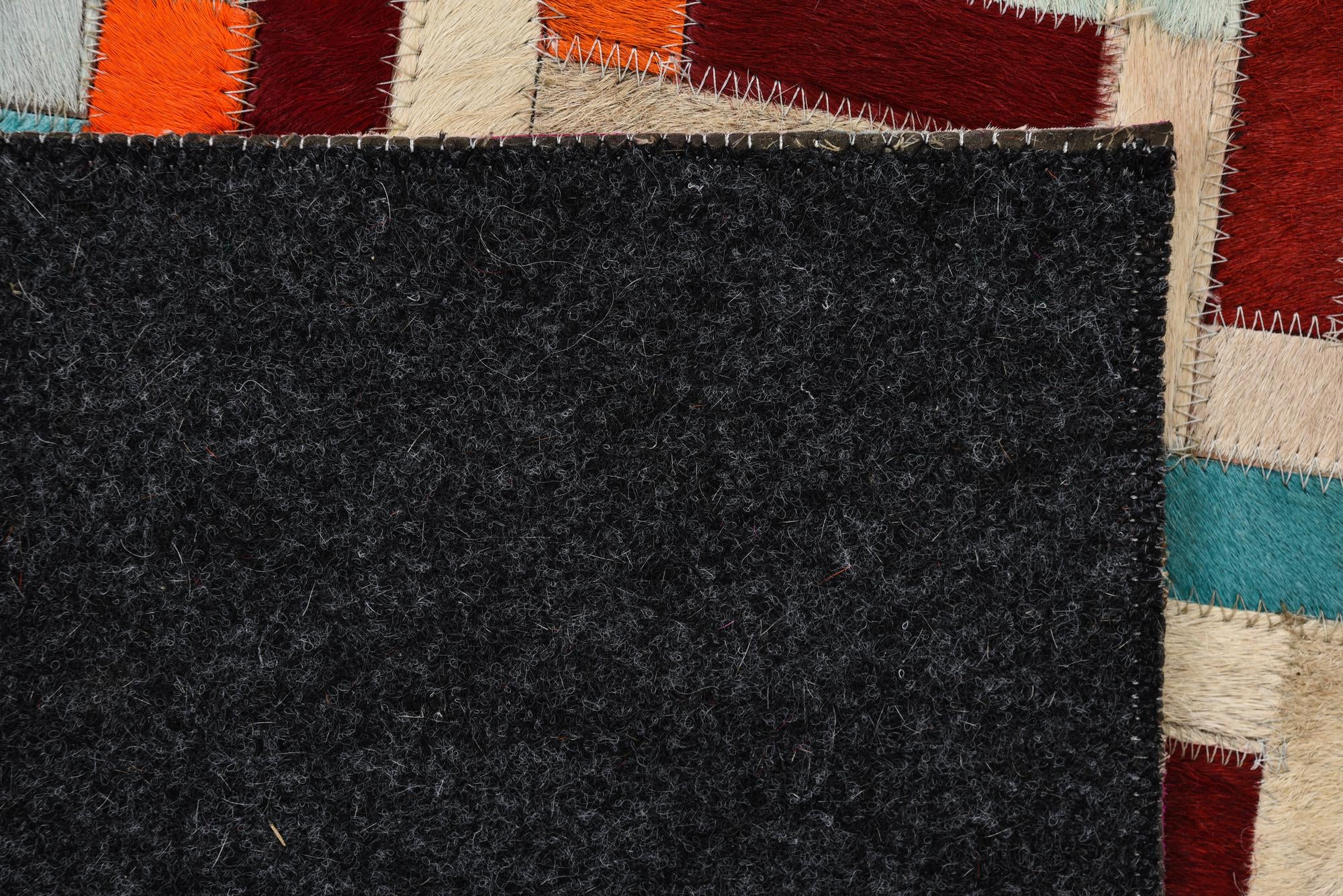 2' 1 x 3' Cowhide Rug