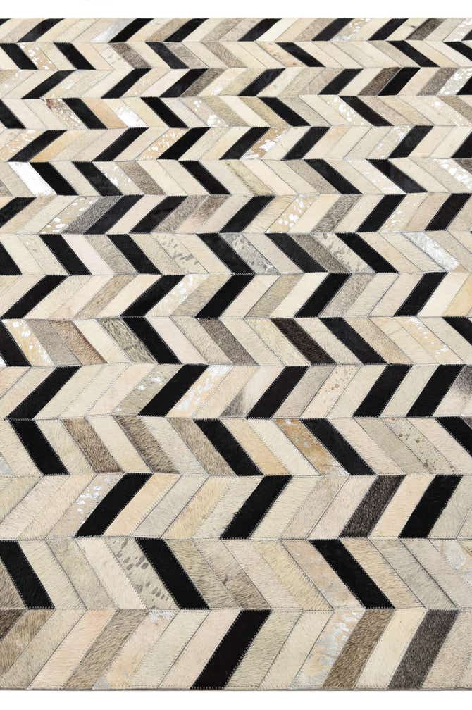 5' 3 x 8' 1 Cowhide Rug