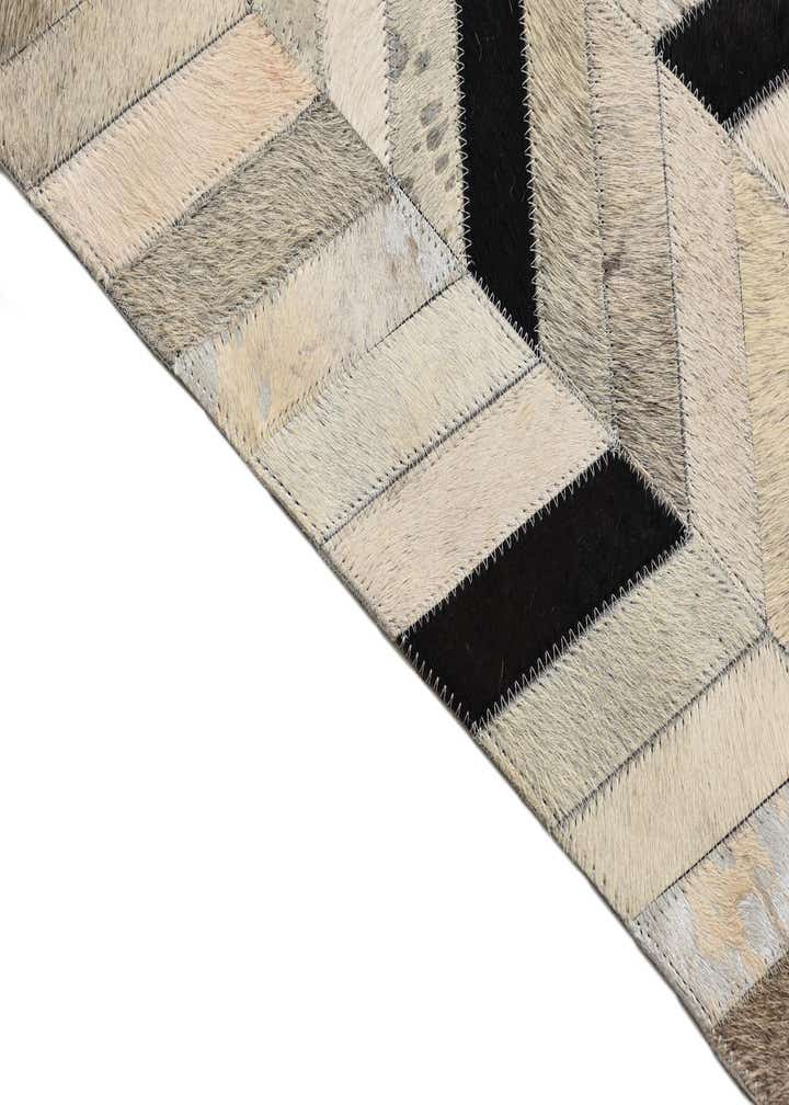 5' 3 x 8' 1 Cowhide Rug