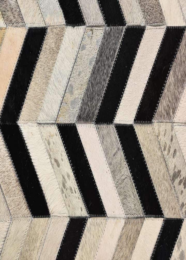 5' 3 x 8' 1 Cowhide Rug