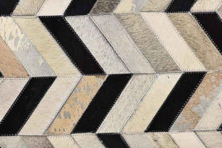 5' 3 x 8' 1 Cowhide Rug