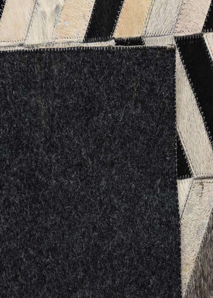5' 3 x 8' 1 Cowhide Rug