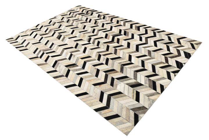 5' 3 x 8' 1 Cowhide Rug