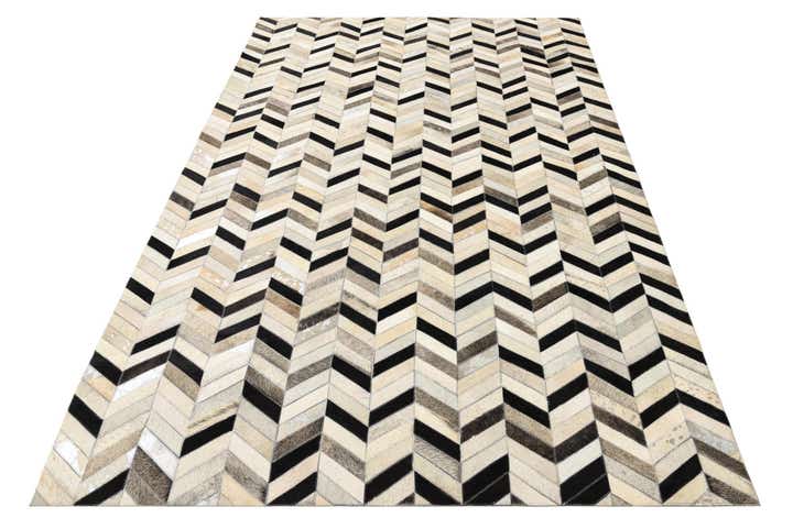 5' 3 x 8' 1 Cowhide Rug