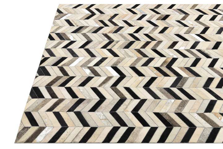 5' 3 x 8' 1 Cowhide Rug