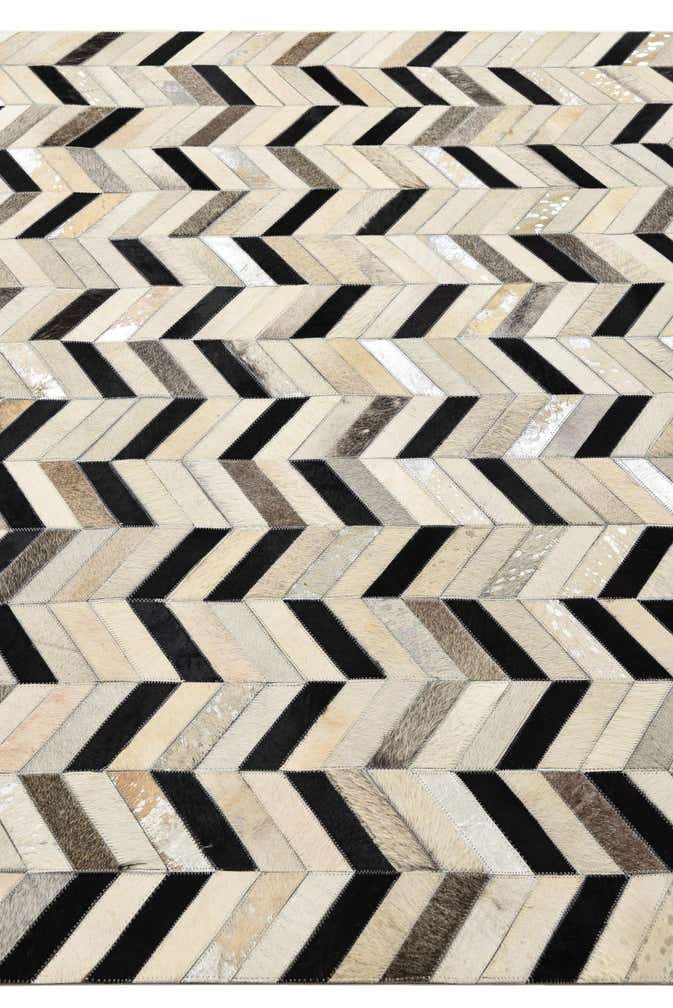 5' 3 x 8' 1 Cowhide Rug