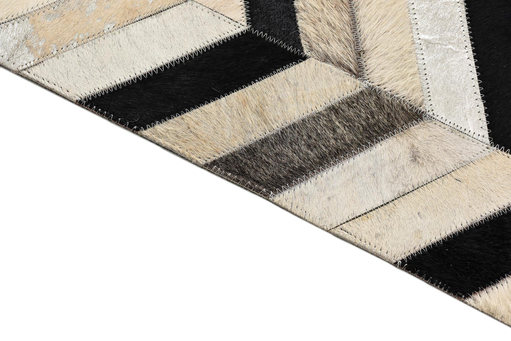 5' 3 x 8' 1 Cowhide Rug