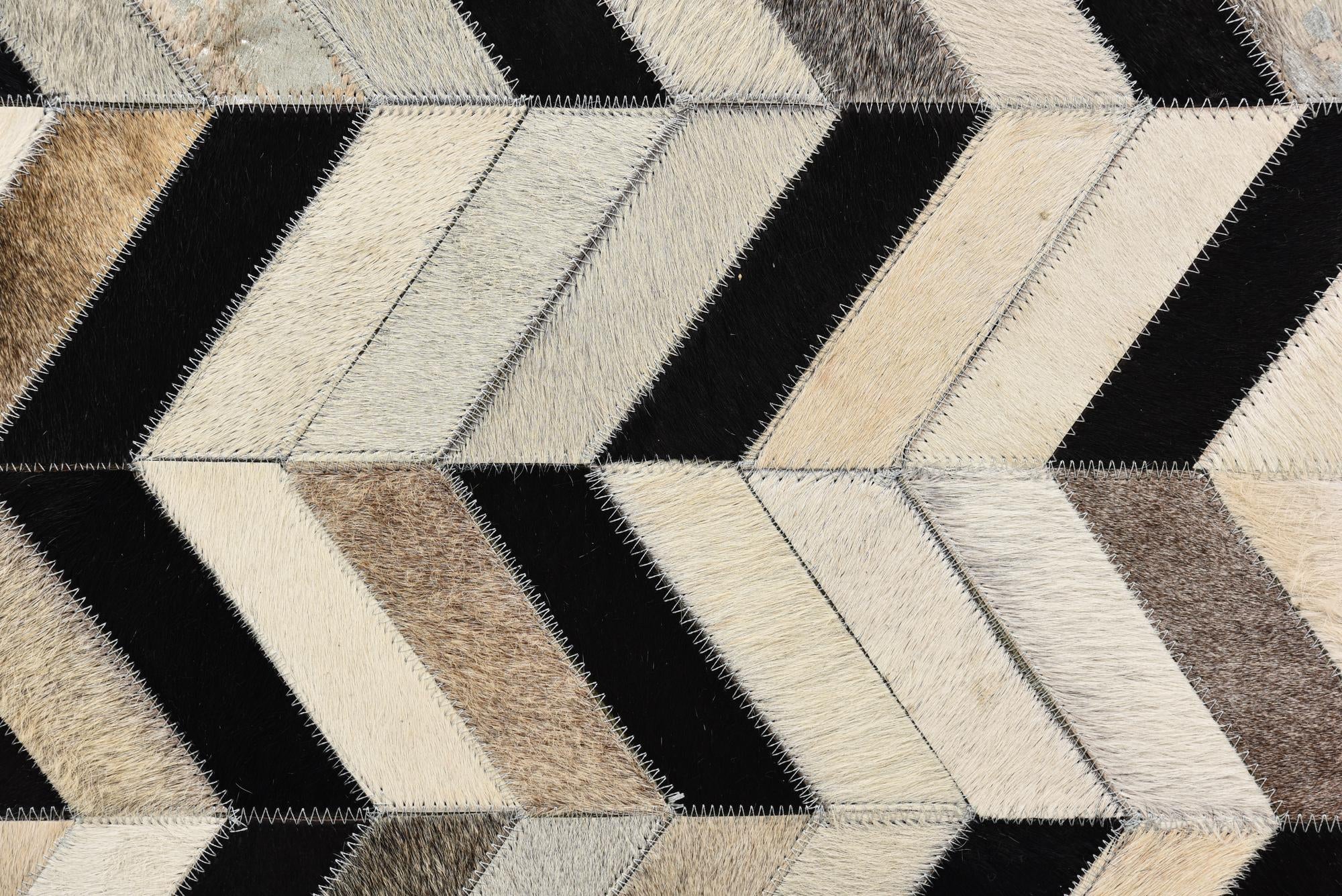 5' 3 x 8' 1 Cowhide Rug