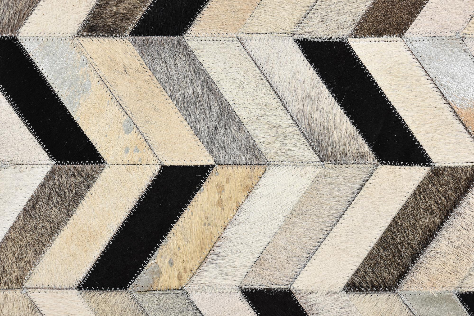 5' 3 x 8' 1 Cowhide Rug