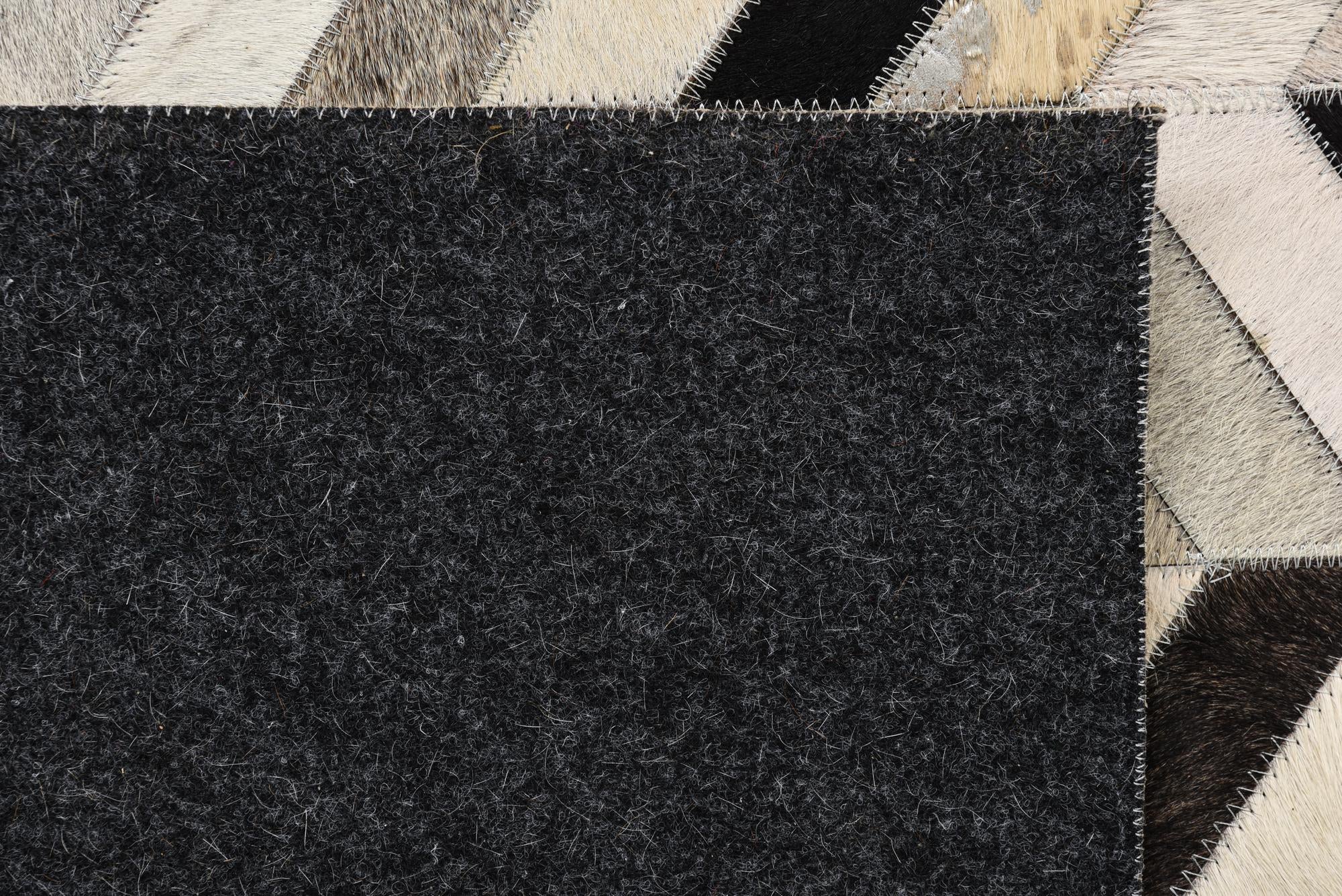 5' 3 x 8' 1 Cowhide Rug