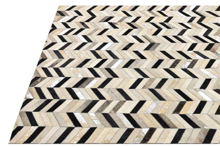 5' 3 x 8' 1 Cowhide Rug