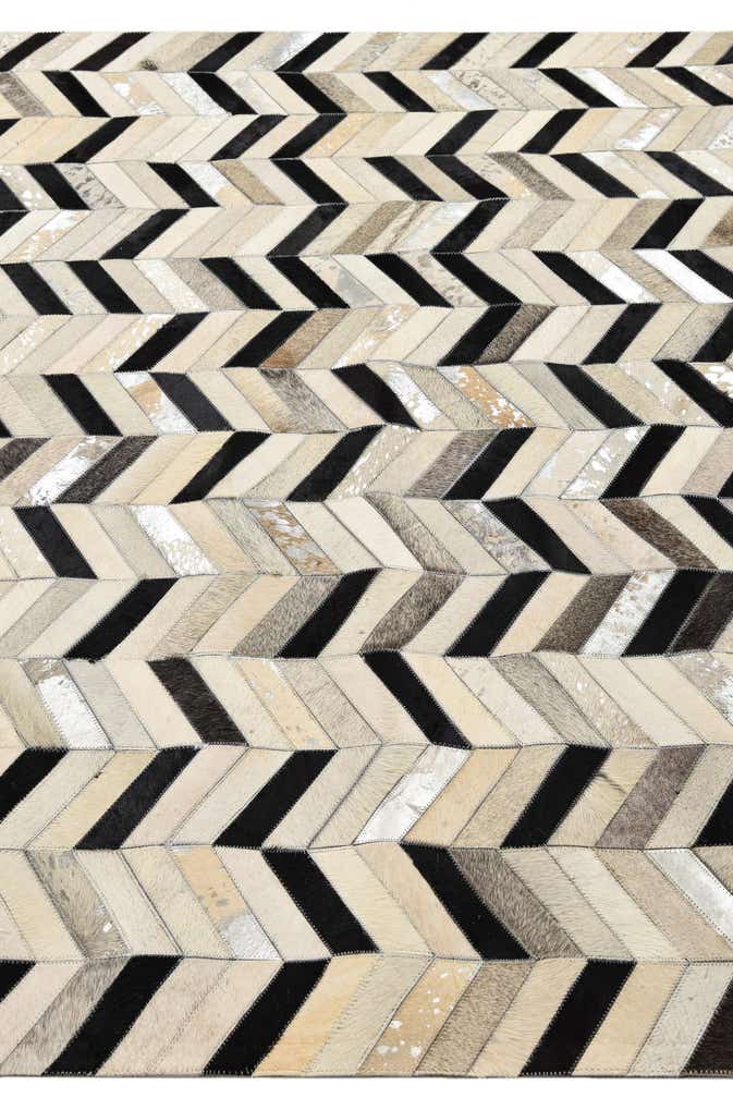 5' 3 x 8' 1 Cowhide Rug