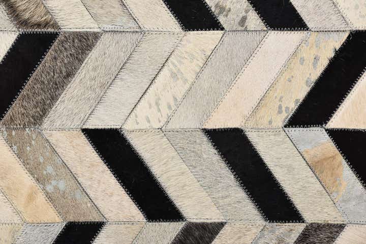 5' 3 x 8' 1 Cowhide Rug