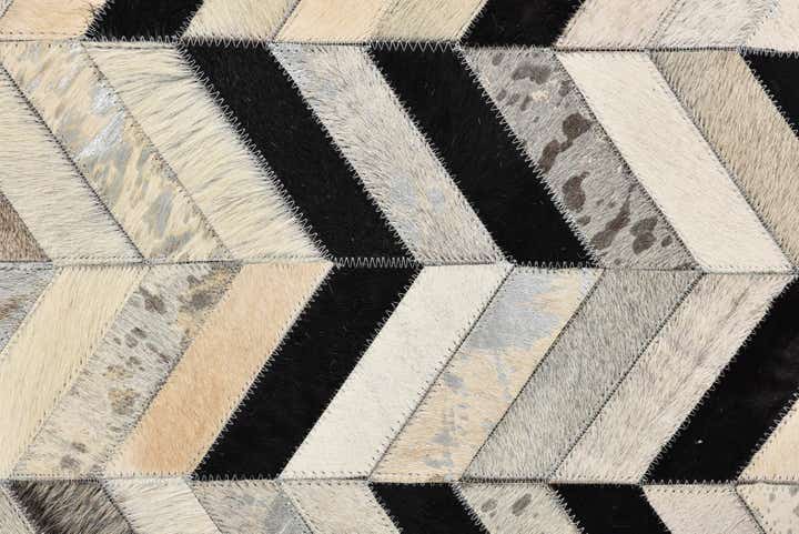 5' 3 x 8' 1 Cowhide Rug