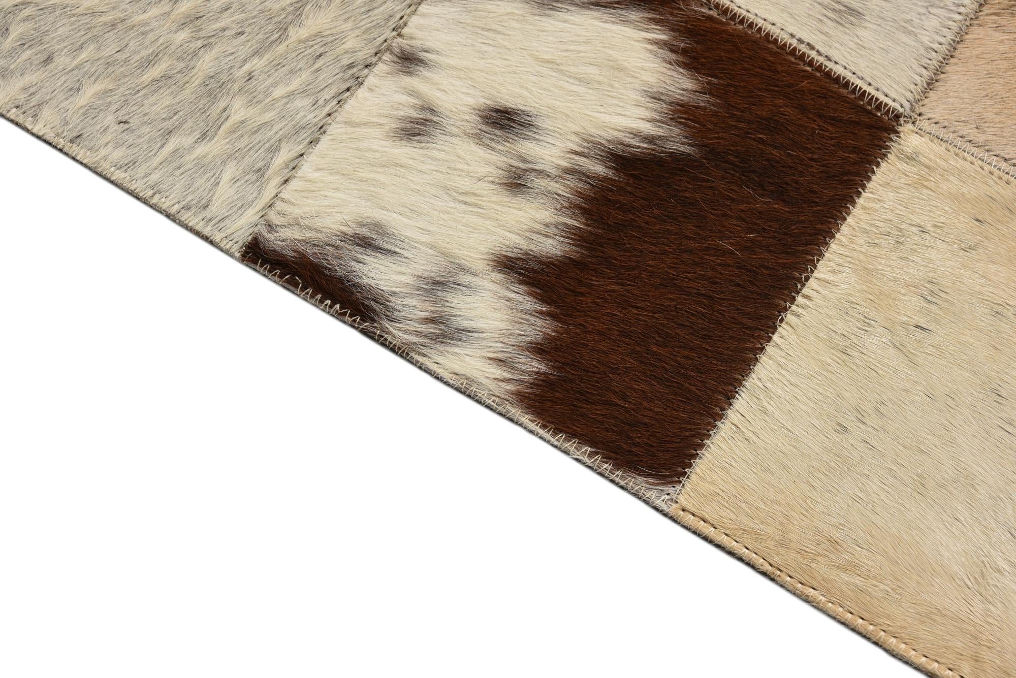 5' x 7' 9 Cowhide Rug