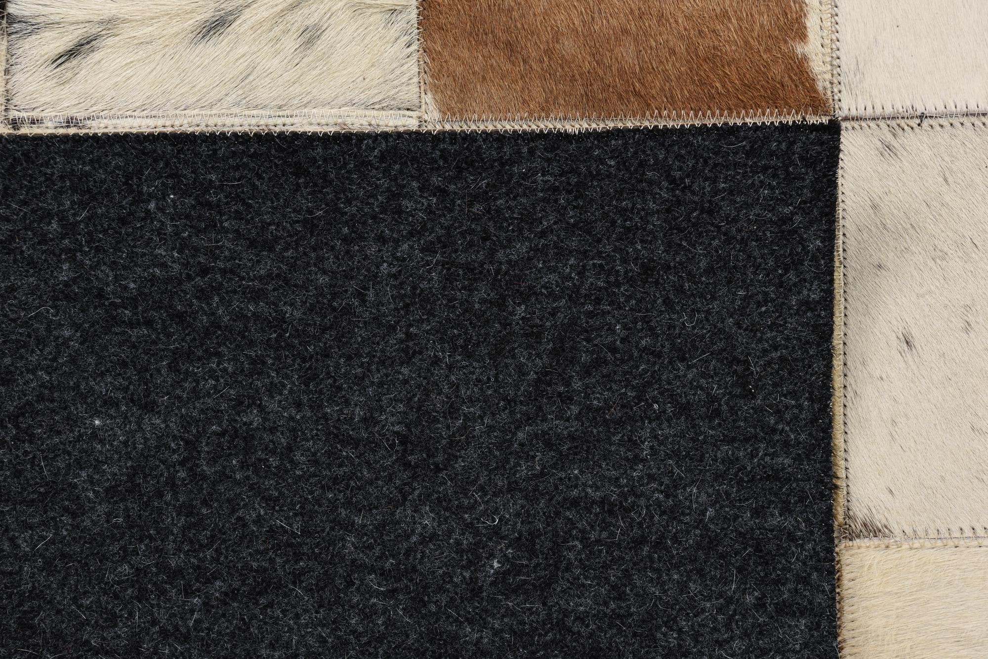 5' x 7' 9 Cowhide Rug